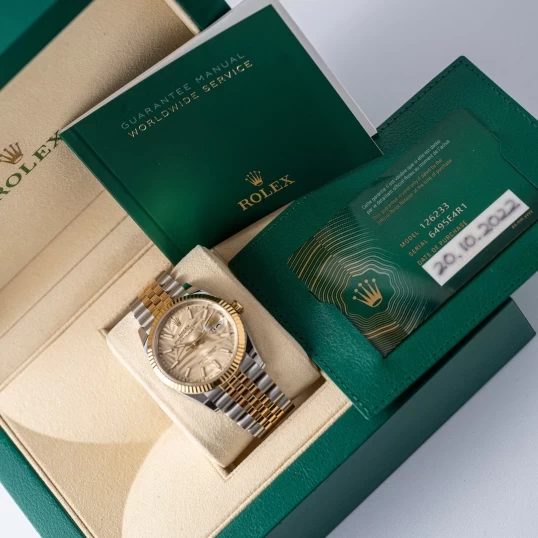 Rolex Datejust 36 126233-0037 Mặt Số Cây Lá Nhiệt Đới Vàng Champagne Cọc Số Dạ Quang