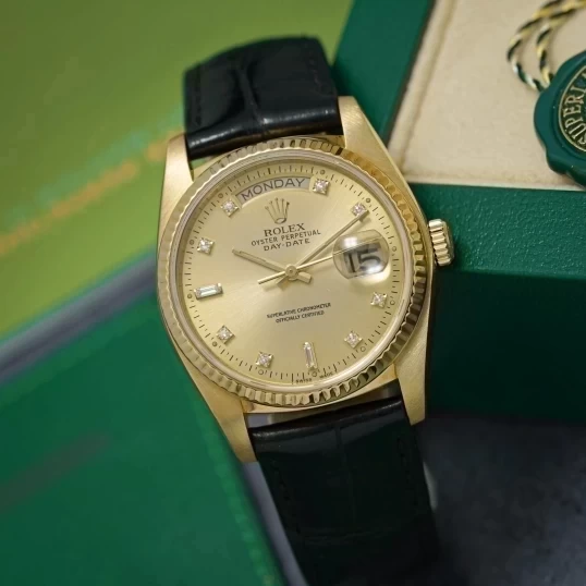 Rolex Oyster Perpetual Day-Date 36mm 18038 Mặt vàng chải tia cọc kim cương