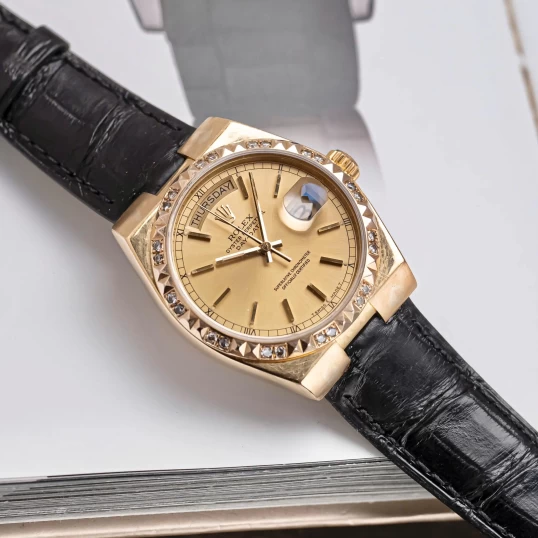 Rolex Oysterquartz Day-Date 19018 Yellow Gold Champagne Dial Diamond Bezel