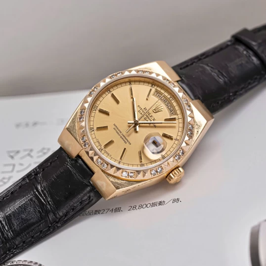 Rolex Oysterquartz Day-Date 19018 Yellow Gold Champagne Dial Diamond Bezel
