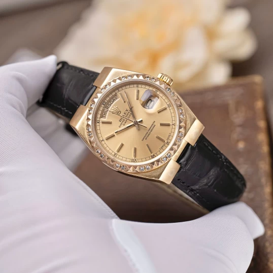 Rolex Oysterquartz Day-Date 19018 Yellow Gold Champagne Dial Diamond Bezel