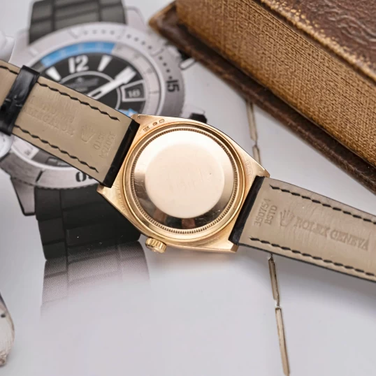 Rolex Oysterquartz Day-Date 19018 Yellow Gold Champagne Dial Diamond Bezel
