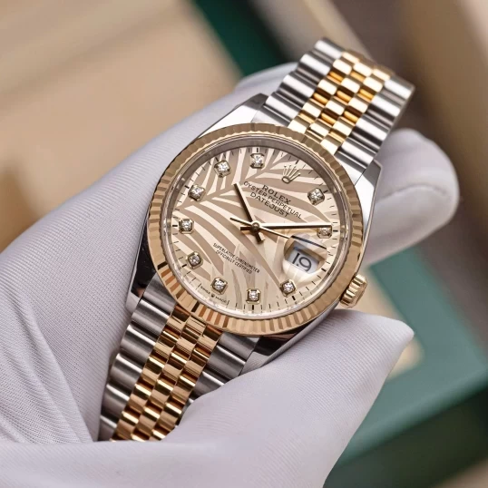 Rolex Oyster Perpetual Datejust 36mm Ref. 126233  Champagne Palm Motif Dial