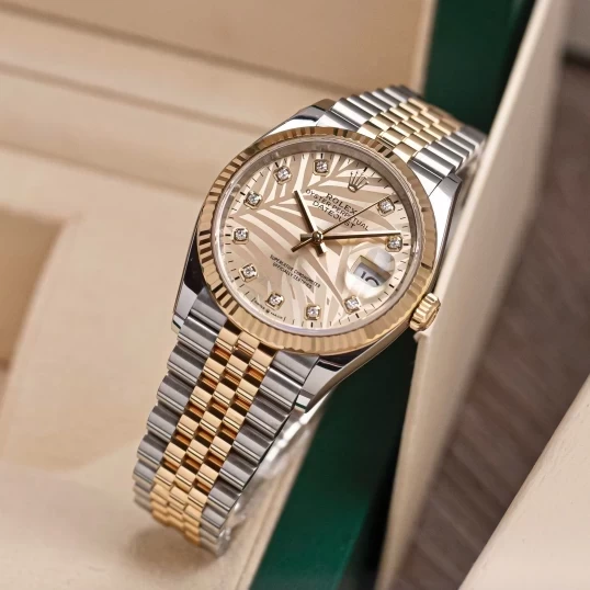 Rolex Oyster Perpetual Datejust 36mm Ref. 126233  Champagne Palm Motif Dial