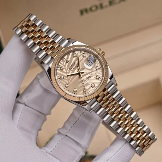Rolex Oyster Perpetual Datejust 36mm Ref. 126233  Champagne Palm Motif Dial