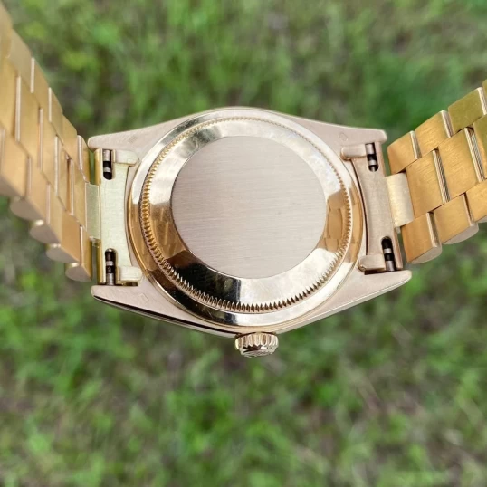 Rolex Oyster Perpetual Day-Date 36mm 18K Yellow Gold Champagne Roman Diamond Dial – Ref. 18238