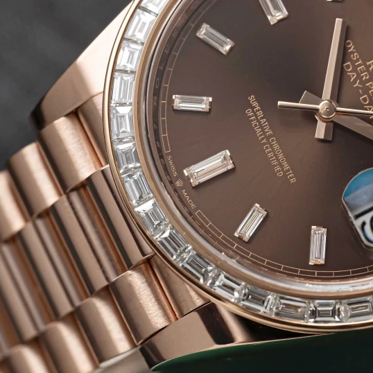 Rolex Oyster Perpetual Day-Date 40mm 228235 Everose Gold Chocolate Dial – Custom Baguette Diamond Bezel