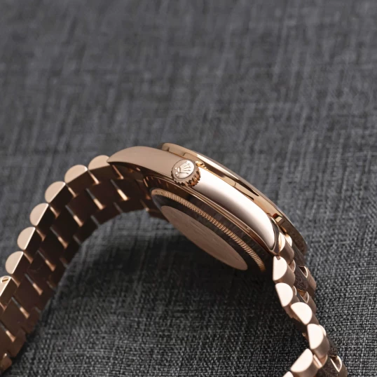 Rolex Oyster Perpetual Day-Date 40mm 228235 Everose Gold Chocolate Dial – Custom Baguette Diamond Bezel