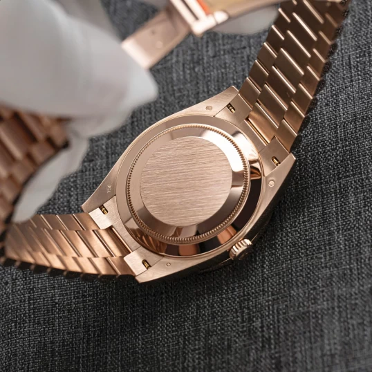 Rolex Oyster Perpetual Day-Date 40mm 228235 Everose Gold Chocolate Dial – Custom Baguette Diamond Bezel
