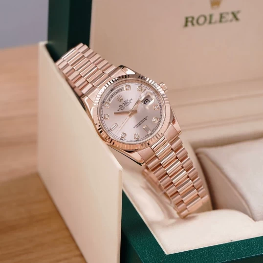 Rolex Day-Date 36 Sundust Dial – Ref. 118235