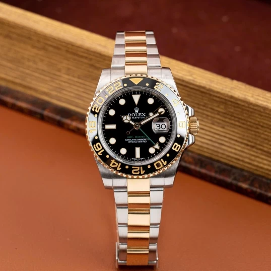 Rolex GMT-Master II Black Dial Demi Gold 40mm – Ref. 116713LN