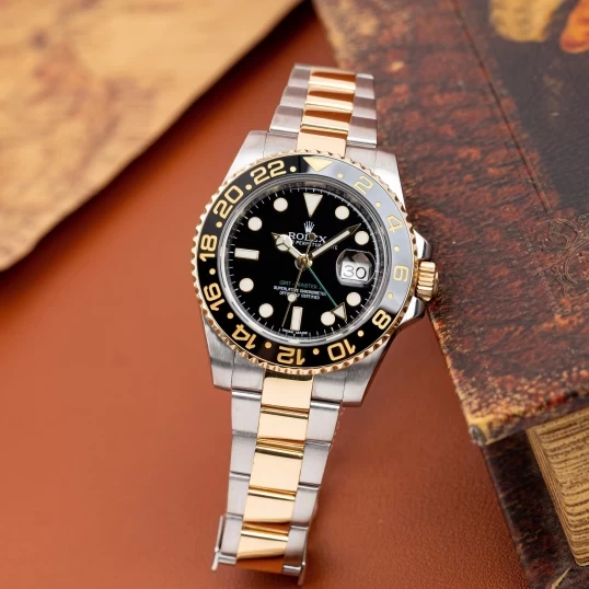 Rolex GMT-Master II Black Dial Demi Gold 40mm – Ref. 116713LN