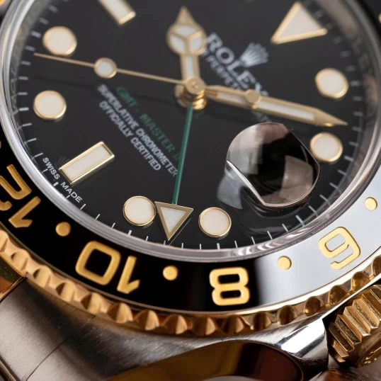 Rolex GMT-Master II Black Dial Demi Gold 40mm – Ref. 116713LN